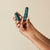 Reusable Tampon Applicator by DAME in dark green with packaging. Eco-friendly, medical-grade design for sustainable feminine care.