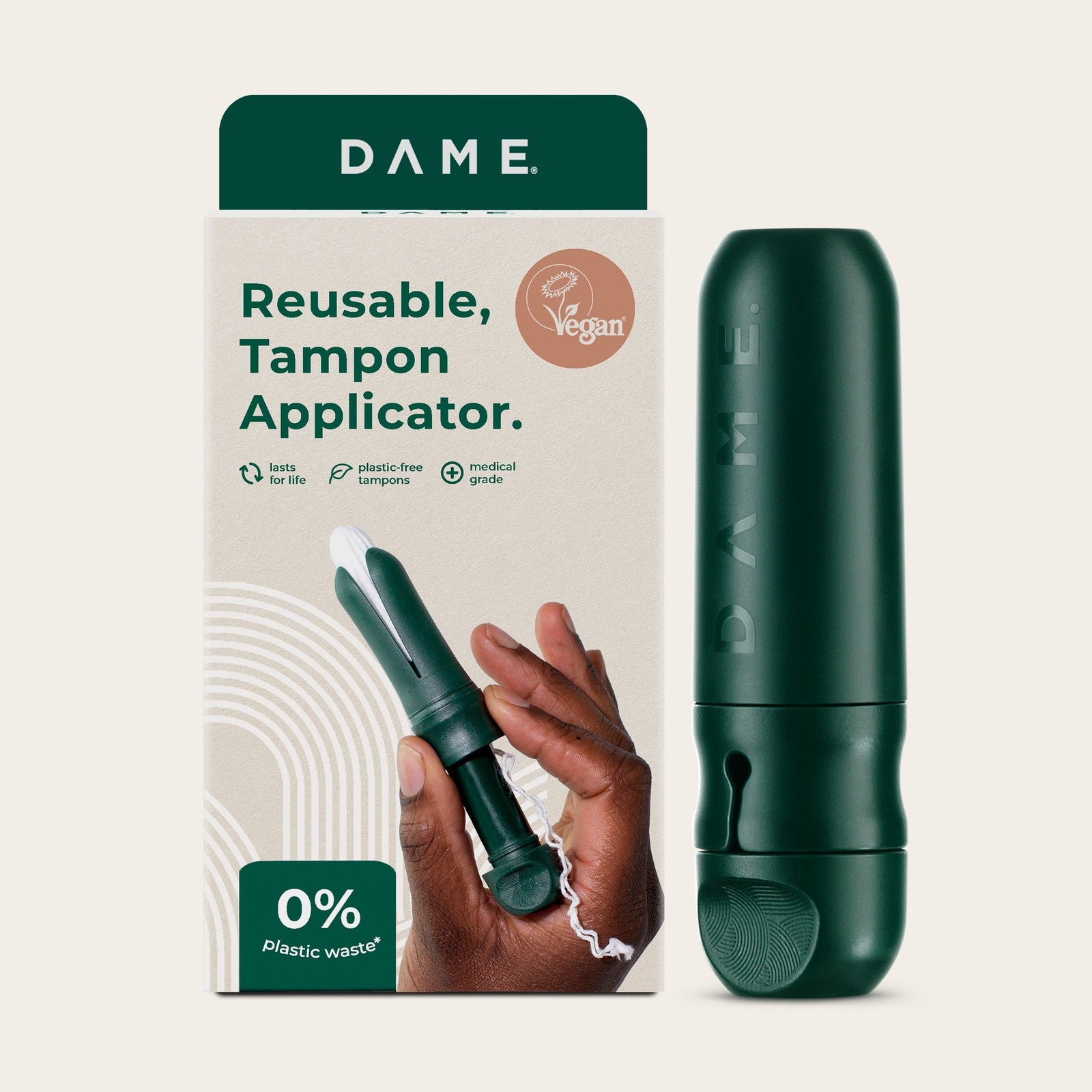 Reusable Tampon Applicator by DAME in dark green with packaging. Eco-friendly, medical-grade design for sustainable feminine care.