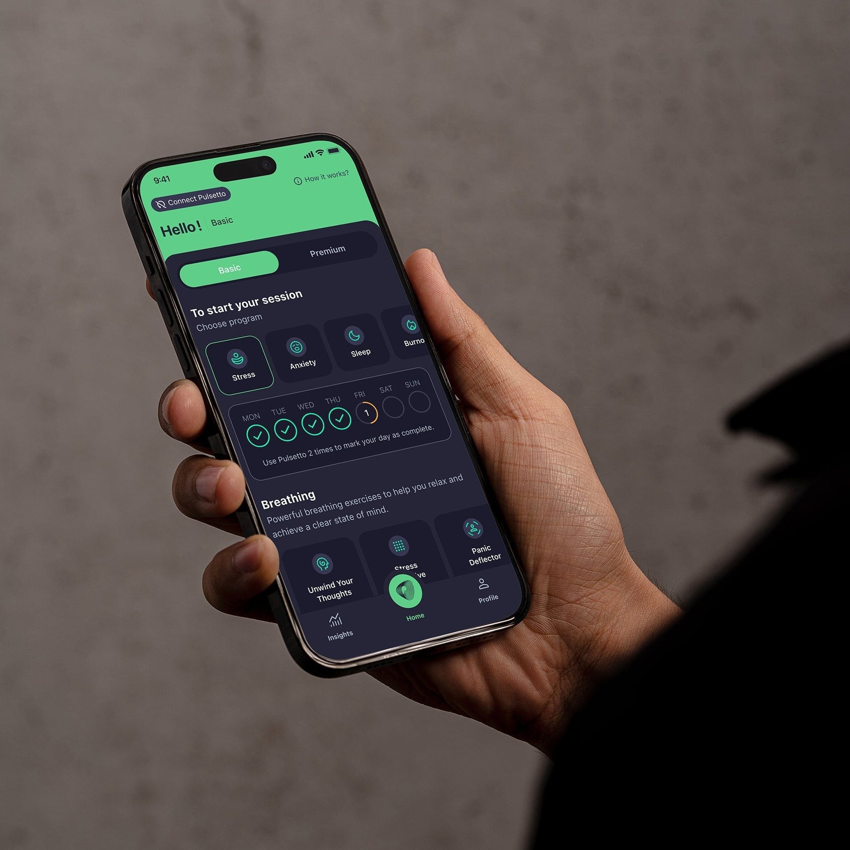 Pulsetto vagus nerve stimulation device held in hands, showcasing compact design for at-home vagus nerve therapy and natural anxiety relief.