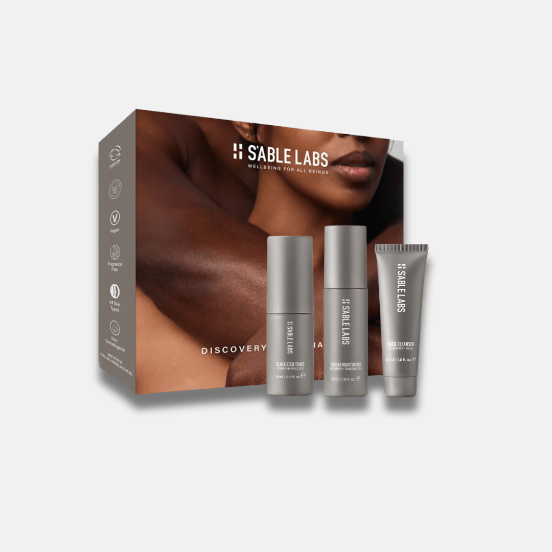 Melanin Skincare Kit - Glow & Nourish | Mini Sizes featuring Qasil Cleanser, Black Seed Toner, and Baobab Moisturizer in sleek grey packaging. Ideal for testing natural skincare for melanin-rich skin.