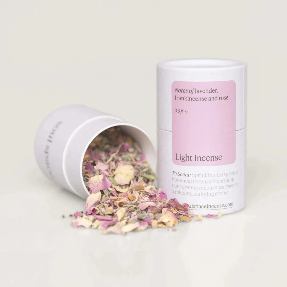Light Incense Frankincense &amp; Rose botanical incense blend in a white and pink cylindrical container with dried floral mix for calming home fragrance.